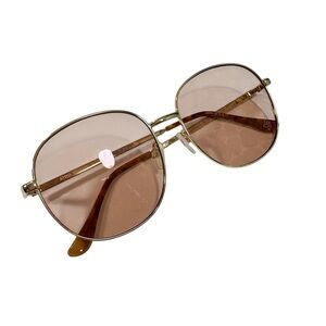 AIRE Atria oversized round sunglasses in gold M L
